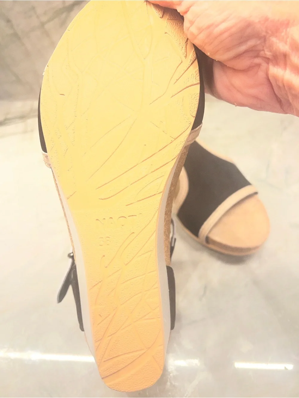 Naot Black Sandals with Beige Trim and Metallic Buckle